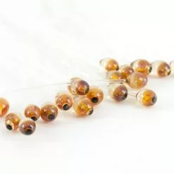 Funky Shrimp Eyes - Funky Fly Tying 26 Funky Shrimp Eyes - Funky Fly Tying -Fly Tying Materials Sales DNA Funky Shrimp Eyes Dark Amber